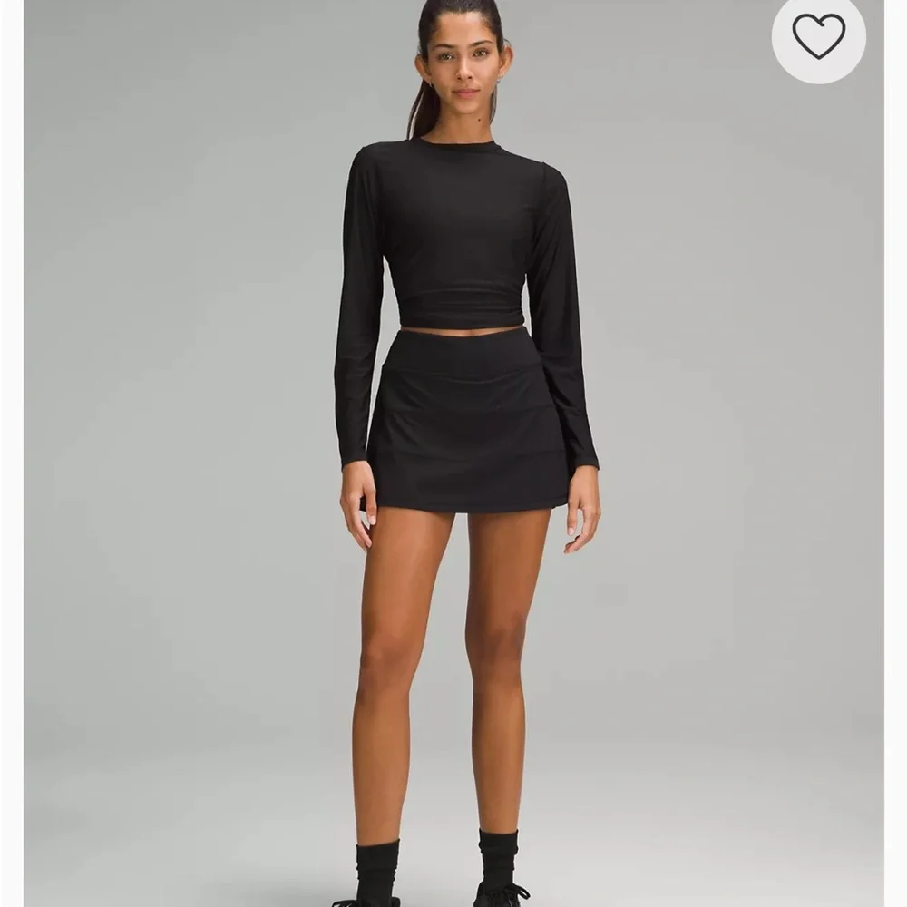 Lululemon size 10 black Pace Rival Mid-Rise Skirt
Long - Picture 5 of 14